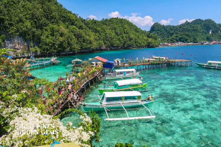 Jelmers Resort is one of Dinagat Island tourist spots where boats seem to float in midair because of how clear the water is.