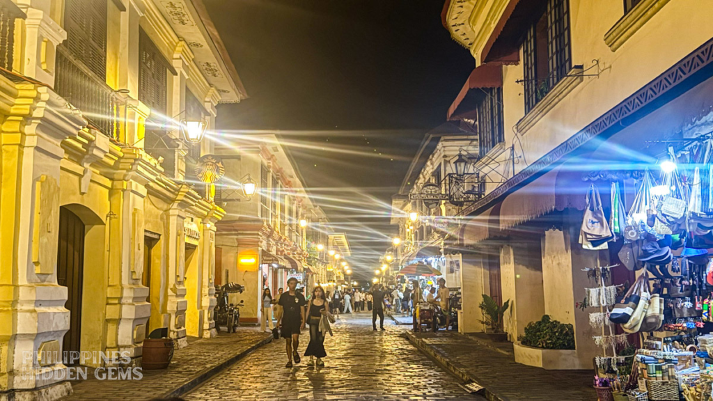 Calle Crisologo old Spanish era street in Vigan, Philippines, at night.