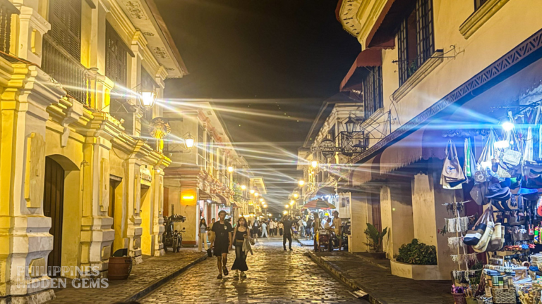 Calle Crisologo old Spanish era street in Vigan, Philippines, at night.