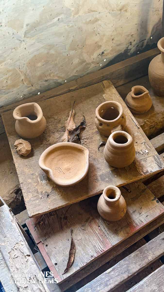 Fresh pieces of pottery pieces on wood for drying.