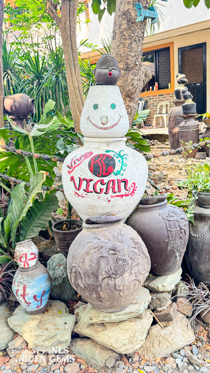Decorative pottery pieces at a garden.